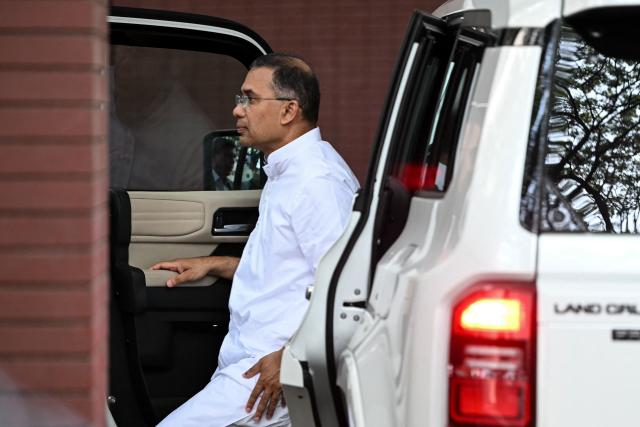 Bangladesh Nationalist Party (BNP) chairman and election candidate Tarique Rahman arrives at the party office in Dhaka on February 13, 2026. The Bangladesh Nationalist Party (BNP) claimed a thumping win on February 13 in the first elections held since a deadly 2024 uprising, with leader Tarique Rahman poised to become prime minister. (Photo by Sajjad HUSSAIN / AFP)