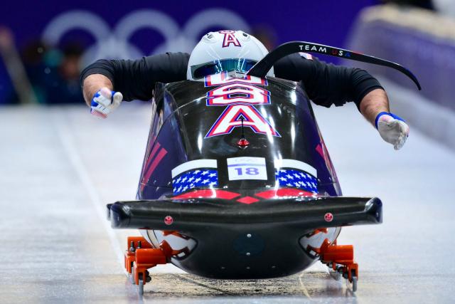 USA's Frankie Del Duca pilots in the bobsleigh men's 2-man training Heat 3 at Cortina Sliding Centre during the Milano Cortina 2026 Winter Olympic Games in Cortina d'Ampezzo on February 13, 2026. (Photo by Stefano RELLANDINI / AFP)