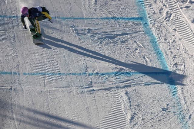 Australia's Josie Baff competes in the snowboard women's cross seeding run 1 during the Milano Cortina 2026 Winter Olympic Games at Livigno Snow Park, in Livigno (Valtellina), on February 13, 2026. (Photo by Jeff PACHOUD / AFP)
