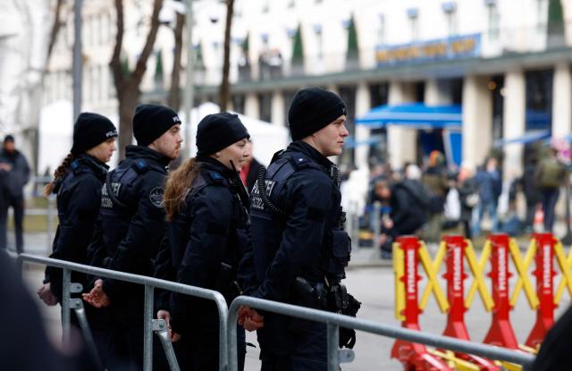Policemen secure the area around the Hotel Bayerischer Hof, venue of the 62nd Munich Security Conference (MSC), prior to the conference's opening on February 13, 2026 in Munich, southern Germany. Heads of state and government as well as foreign and defence ministers from all over the world are expected to attend the security policy talks from February 13 to 15, 2026. (Photo by Michaela STACHE / AFP)