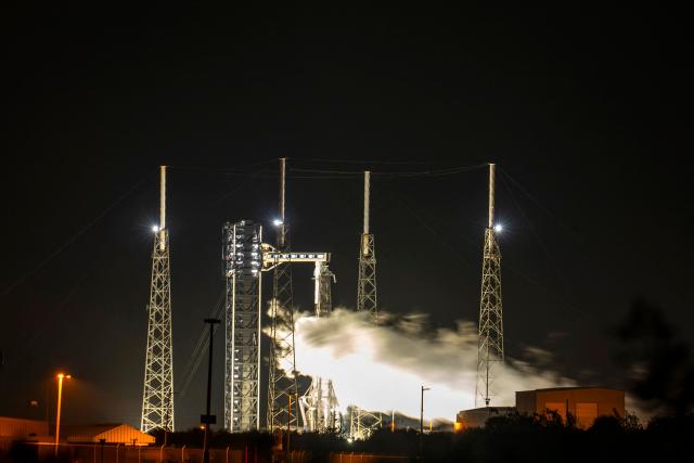 A cloud of smoke drifts in the wind as a SpaceX Falcon 9 rocket with the company's Dragon spacecraft on top fuels as it prepares to launch from Space Launch Complex 40 for the Crew-12 mission at Cape Canaveral Space Force Station in Florida on February 13, 2026. (Photo by Jim WATSON / AFP)