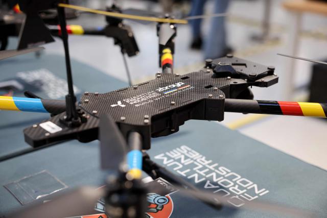 A drone is decorated in the colors of Ukraine and Germany, pictured during a visit of the Ukrainian President and the German Defence Minister at the production facility of drone producing company Quantum Frontline Industries (QFI) in Gilching near Munich, southern Germany, on the sidelines of the 62nd Munich Security Conference (MSC) on February 13, 2026. Heads of state and government as well as foreign and defence ministers from all over the world are expected to attend the security policy talks from February 13 to 15, 2026. (Photo by Alexandra BEIER / AFP)