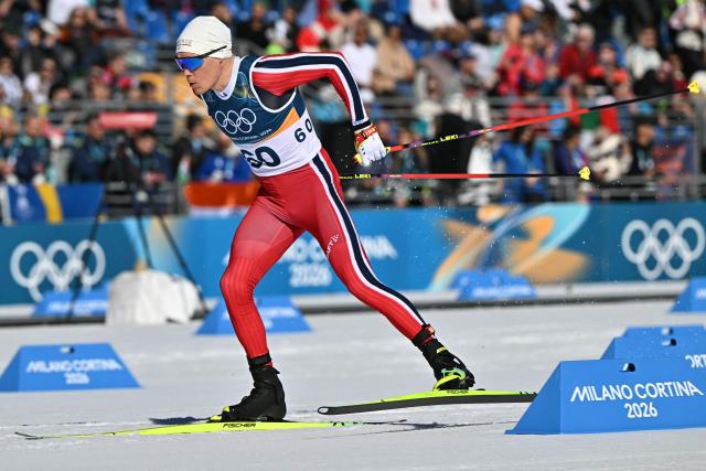 Norway's Martin Loewstroem Nyenget competes during the men's 10km cross-country interval start free event of the Milano Cortina 2026 Winter Olympic Games at Tesero Cross-Country Skiing Stadium in Lago di Tesero (Val di Fiemme) on February 13, 2026. (Photo by Javier SORIANO / AFP)