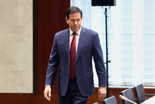 US Secretary of State Marco Rubio attends a bilateral meeting with China's Foreign Minister (not in picture) in Munich, on February 13, 2026, on the sidelines of the Munich Security Conference (MSC). Heads of state and government as well as foreign and defence ministers from all over the world are expected to attend the security policy talks from February 13 to 15, 2026. (Photo by Alex Brandon / POOL / AFP)