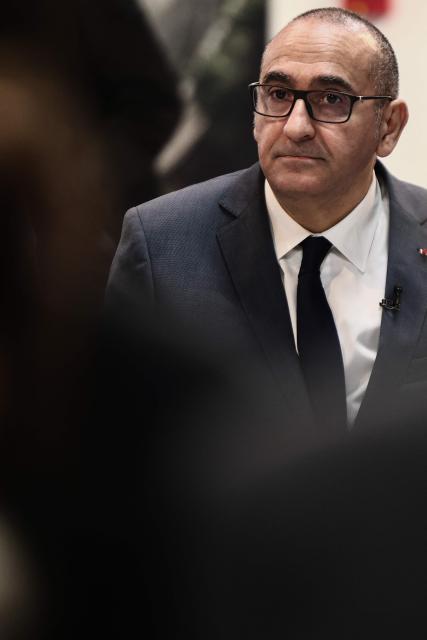 France's Interior Minister Laurent Nunez talks with association members at the ZEF theater to discuss prevention and urban policy during his visit to Marseille, southern France on February 13, 2026. (Photo by Thibaud MORITZ / AFP)