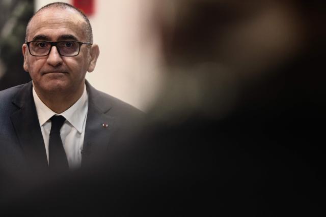 France's Interior Minister Laurent Nunez talks with association members at the ZEF theater to discuss prevention and urban policy during his visit to Marseille, southern France on February 13, 2026. (Photo by Thibaud MORITZ / AFP)