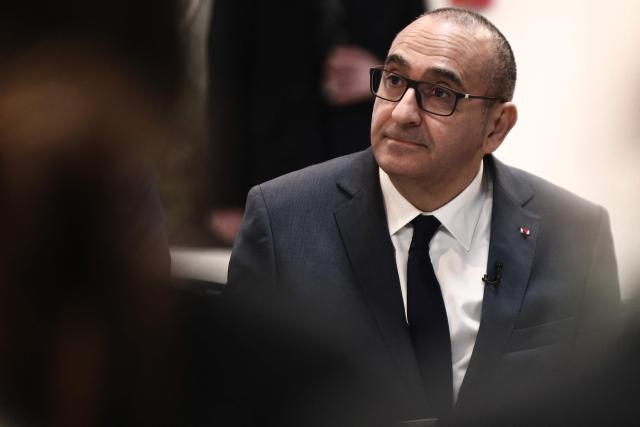 France's Interior Minister Laurent Nunez talks with association members at the ZEF theater to discuss prevention and urban policy during his visit to Marseille, southern France on February 13, 2026. (Photo by Thibaud MORITZ / AFP)