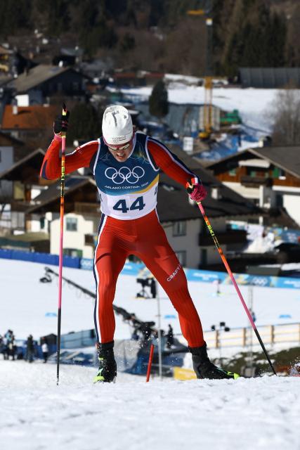 Norway's Johannes Hoesflot Klaebo competes during the men's 10km cross-country interval start free event of the Milano Cortina 2026 Winter Olympic Games at Tesero Cross-Country Skiing Stadium in Lago di Tesero (Val di Fiemme) on February 13, 2026. (Photo by Anne-Christine POUJOULAT / AFP)