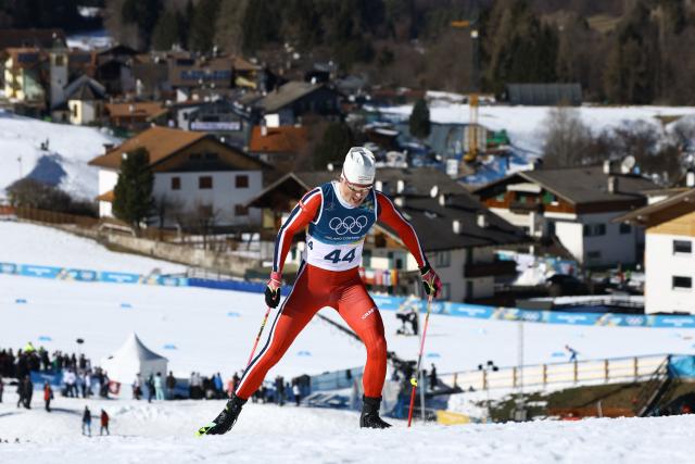 Norway's Johannes Hoesflot Klaebo competes during the men's 10km cross-country interval start free event of the Milano Cortina 2026 Winter Olympic Games at Tesero Cross-Country Skiing Stadium in Lago di Tesero (Val di Fiemme) on February 13, 2026. (Photo by Anne-Christine POUJOULAT / AFP)