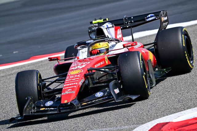 Ferrari's British driver Lewis Hamilton drives on the third day of the Formula One pre-season testing at the Bahrain International Circuit in Sakhir on February 13, 2026. (Photo by Giuseppe CACACE / AFP)