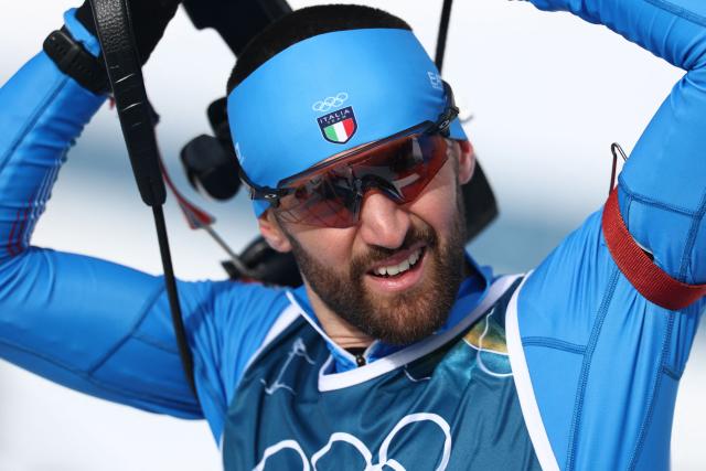 Italy's Nicola Romanin prepares to participate in the men's biathlon 10km sprint event during the Milano Cortina 2026 Winter Olympic Games at the Anterselva Biathlon Arena (Sudtirol Arena) in Anterselva (Val Pusteria) on February 13, 2026. (Photo by FRANCK FIFE / AFP)