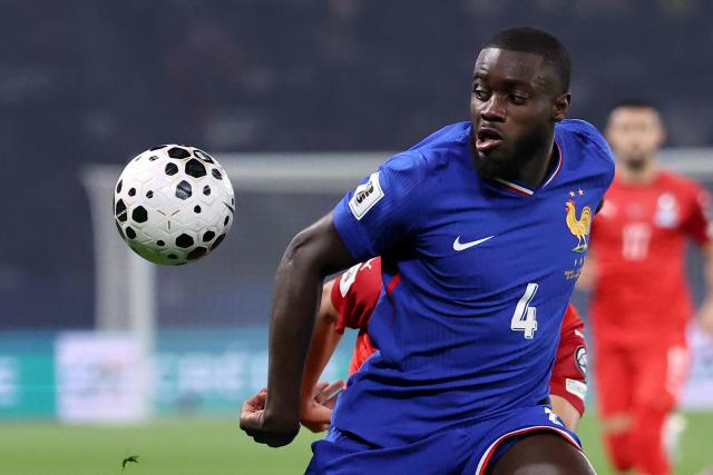 (FILES) France's defender #04 Dayot Upamecano watches the ball during the FIFA World Cup 2026 Group D European qualification football match between France and Azerbaijan at the Parc des Princes Stadium in Paris, on October 10, 2025. Dayot Upamecano, a mainstay of France’s central defense, has extended his contract with Bayern Munich by four seasons until the summer of 2030, the Munich club announced in a statement on February 13, 2026. (Photo by Anne-Christine POUJOULAT / AFP)