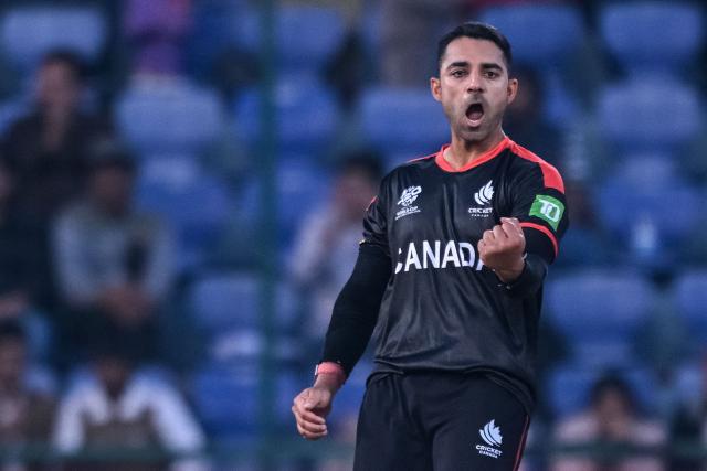 Canada's Saad Bin Zafar celebrates after taking the wicket of UAE's Mayank Kumar during the 2026 ICC Men's T20 Cricket World Cup group stage match between Canada and United Arab Emirates at the Arun Jaitley Stadium in New Delhi on February 13, 2026. (Photo by Arun SANKAR / AFP)