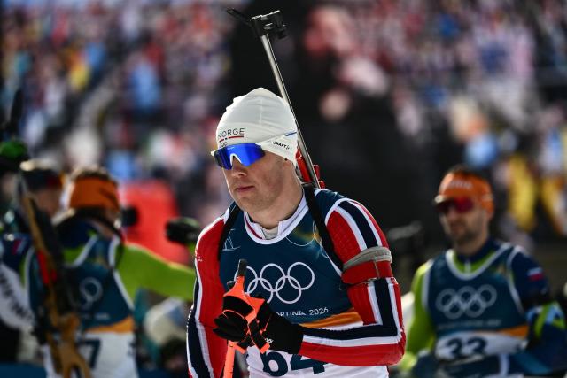 Norway's Johannes Dale-Skjevdal looks on during the warm up in the men's biathlon 10km sprint event during the Milano Cortina 2026 Winter Olympic Games at the Anterselva Biathlon Arena (Sudtirol Arena) in Anterselva (Val Pusteria) on February 13, 2026. (Photo by Marco BERTORELLO / AFP)