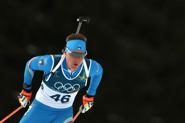 Italy's Lukas Hofer competes in the Olympic Games at the Anterselva Biathlon Arena (Sudtirol Arena) in Anterselva (Val Pusteria) on February 13, 2026. (Photo by FRANCK FIFE / AFP)