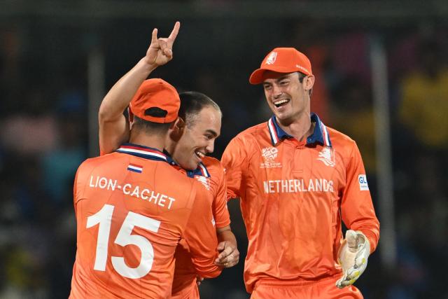 Netherlands' Kyle Klein (C) celebrates with teammates after taking the wicket of USA's Shayan Jahangir during the 2026 ICC Men's T20 Cricket World Cup group stage match between Netherlands and USA at MA Chidambaram Stadium in Chennai on February 13, 2026. (Photo by R. Satish BABU / AFP)