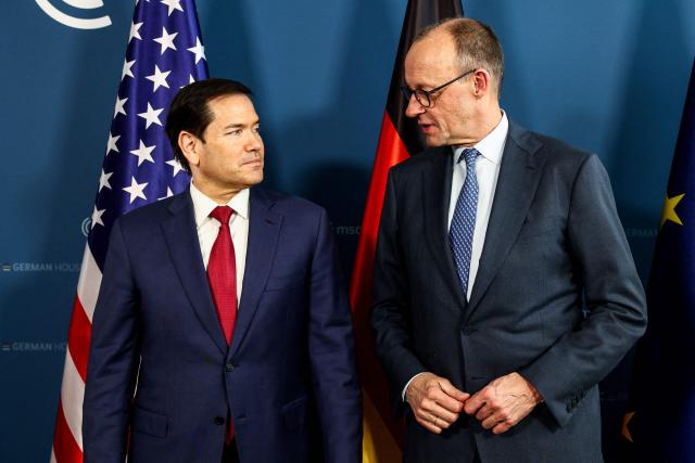German Chancellor Friedrich Merz (R) and US Secretary of State Marco Rubio attend a bilateral meeting on the sidelines of the Munich Security Conference (MSC) in Munich, Germany, February 13, 2026. (Photo by Liesa Johannssen / POOL / AFP)