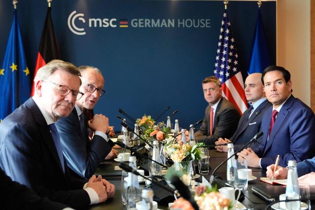 German Chancellor Friedrich Merz (2nd L), German Foreign Minister Johann Wadephul (L) and US Secretary of State Marco Rubio (R) as well as delegation members have taken their seats for a bilateral meeting on the sidelines of the Munich Security Conference (MSC) in Munich, Germany, February 13, 2026. (Photo by Alex Brandon / POOL / AFP)