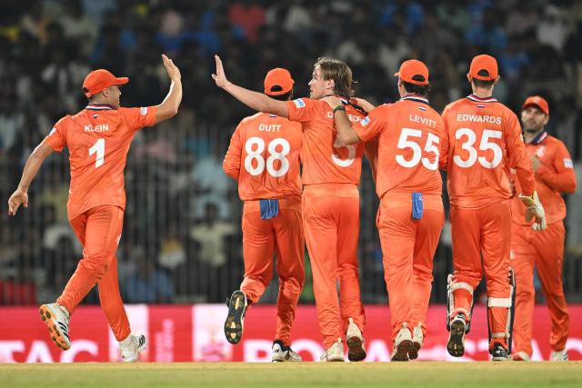 Netherlands' Bas de Leede (3L) celebrates with teammates after taking the wicket of USA's Saiteja Mukkamalla during the 2026 ICC Men's T20 Cricket World Cup group stage match between Netherlands and USA at MA Chidambaram Stadium in Chennai on February 13, 2026. (Photo by R. Satish BABU / AFP)
