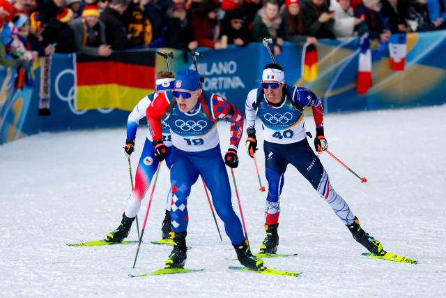 Czech Republic's Vitezslav Hornig (L), Croatia's Matija Legovic (C) and France's Quentin Fillon Maillet (R) compete in the men's biathlon 10km sprint event during the Milano Cortina 2026 Winter Olympic Games at the Anterselva Biathlon Arena (Sudtirol Arena) in Anterselva (Val Pusteria) on February 13, 2026. (Photo by Odd ANDERSEN / AFP)