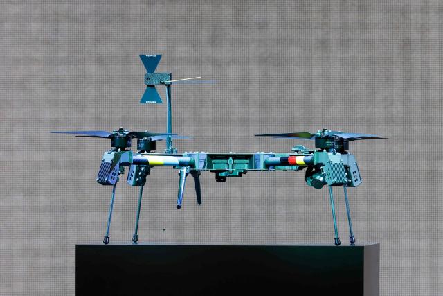 A drone, decorated in the colors of Ukraine and Germany, is pictured during a visit of the Ukrainian President and the German Defence Minister at the production facility of drone producing company Quantum Frontline Industries (QFI) in Gilching near Munich, southern Germany, on the sidelines of the 62nd Munich Security Conference (MSC) on February 13, 2026. Heads of state and government as well as foreign and defence ministers from all over the world are expected to attend the security policy talks from February 13 to 15, 2026. (Photo by Alexandra BEIER / AFP)