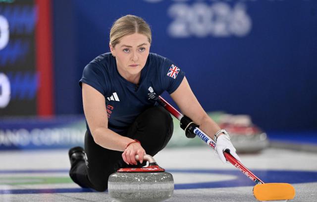 Sophie Sinclair of Great Britain competes in the curling women's round robin between Great Britain and South Korea during the Milano Cortina 2026 Winter Olympic Games at the Cortina Curling Olympic Stadium in Cortina d’Ampezzo on February 13, 2026. (Photo by Tiziana FABI / AFP)