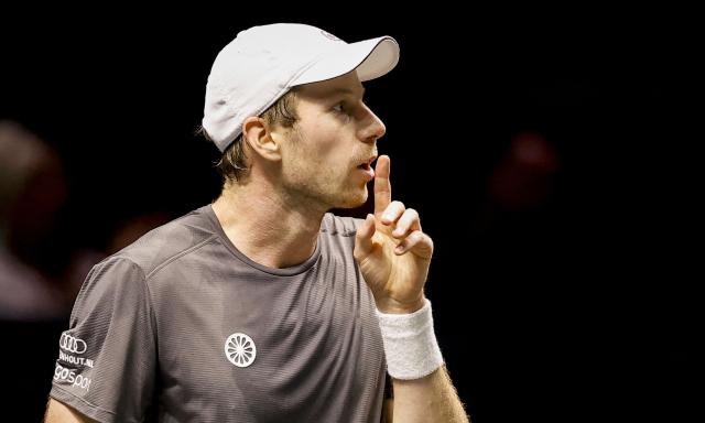Netherlands' Botic van de Zandschulp reacts after a point against Australia's Alex De Minaur during their Rotterdam Open ATP tournament quarter-final tennis match in Rotterdam on February 13, 2026. (Photo by Bas CZERWINSKI / ANP / AFP) / Netherlands OUT
