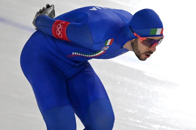 Italy's Davide Ghiotto competes in the speed skating men's 10000m during the Milano Cortina 2026 Winter Olympic Games at Milano Speed Skating Stadium in Milan on February 13, 2026. (Photo by Daniel MUNOZ / AFP)
