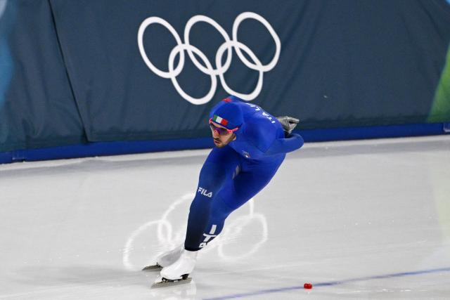 Italy's Davide Ghiotto competes in the speed skating men's 10000m during the Milano Cortina 2026 Winter Olympic Games at Milano Speed Skating Stadium in Milan on February 13, 2026. (Photo by Daniel MUNOZ / AFP)