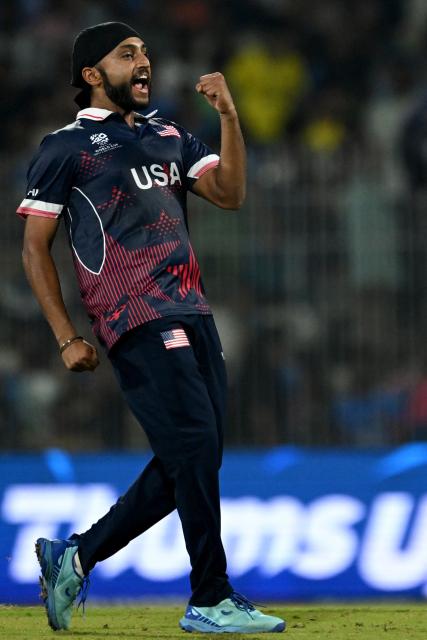 USA's Harmeet Singh celebrates after taking the wicket of Netherlands' Bas de Leede during the 2026 ICC Men's T20 Cricket World Cup group stage match between Netherlands and USA at MA Chidambaram Stadium in Chennai on February 13, 2026. (Photo by R. Satish BABU / AFP)