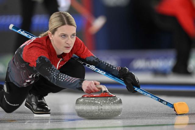 Cory Thiesse of team USA competes in the curling women's round robin between USA and Canada during the Milano Cortina 2026 Winter Olympic Games at the Cortina Curling Olympic Stadium in Cortina d’Ampezzo on February 13, 2026. (Photo by Tiziana FABI / AFP)