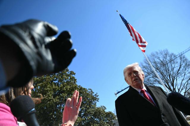 US President Donald Trump speaks to the media as he walks to board Marine One prior to departure from the South Lawn of the White House in Washington, DC, on February 13, 2026. (Photo by ANDREW CABALLERO-REYNOLDS / AFP)