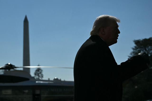 US President Donald Trump speaks to the media as he walks to board Marine One prior to departure from the South Lawn of the White House in Washington, DC, on February 13, 2026. (Photo by ANDREW CABALLERO-REYNOLDS / AFP)