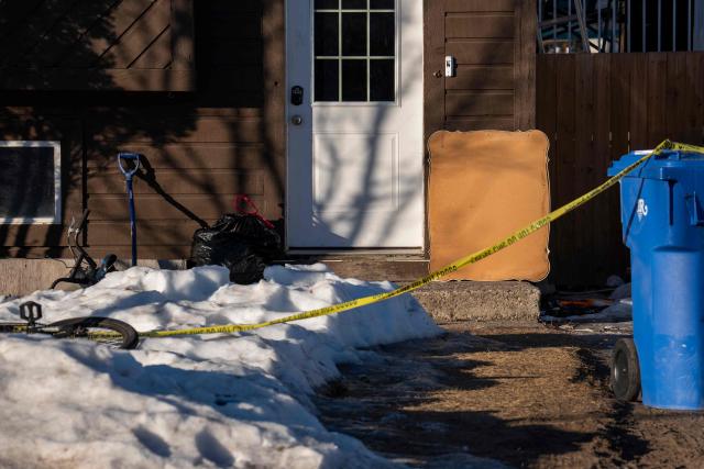 Police tape surrounds a home in Tumbler Ridge, British Columbia, Canada on February 13, 2026, where two people were found dead in one of Canadas deadliest shooting. On February 10, an 18-year-old carried out a mass shooting in a remote mining town, killing six people at a local school, after slaying her mother and stepbrother. Canadian Police commander Dwayne McDonald said authorities still don't know the motive in Tuesday's mass shooting, but the shooter, who took her own life, was known to have mental health issues. (Photo by Paige Taylor White / AFP)