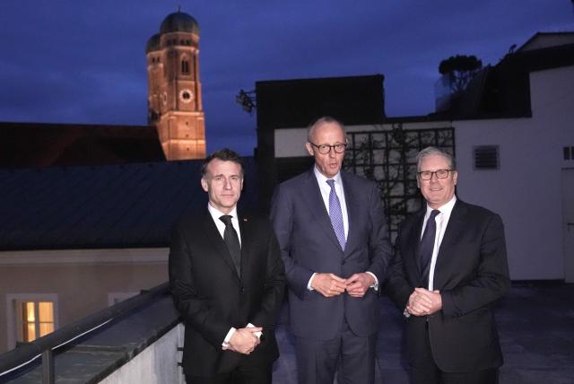 France's President Emmanuel Macron (L), Germany's Chancellor Friedrich Merz (C) and Britain's Prime Minister Keir Starmer (R) pose for a picture ahead of a trilateral meeting during the Munich Security Conference in Germany on February 13, 2026. (Photo by Stefan Rousseau / POOL / AFP)
