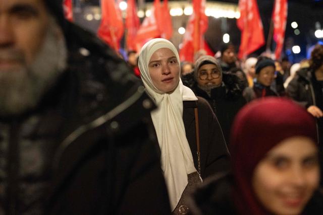 Hundreds of demontrators attend a protest, organized by coalition of 20 civil society organizations in Austria, against the headscarf ban in schools, in Vienna, Austria on February 13, 2026. The protests are in response to the "awareness phase" of a new, stricter headscarf ban for girls under 14 in schools, which began in Vienna and Lower Austria following the semester break. The law, which takes full effect in the 2026/27 school year, prohibits "ideologically or religiously influenced" head coverings in schools, with fines for parents ranging from 150 to 800 euros. (Photo by Joe Klamar / AFP)