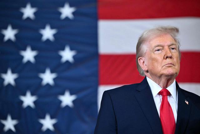 TOPSHOT - US President Donald Trump looks on during an event with members of the military and their families at Fort Bragg, North Carolina on February 13, 2026. Trump will meet on Friday with the special forces soldiers who captured Venezuelan leader Nicolas Maduro in a deadly raid in Caracas in January. (Photo by Mandel NGAN / AFP)