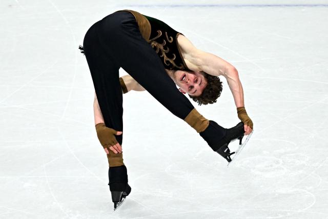 Switzerland's Lukas Britschgi competes in the figure skating men's singles free skating final during the Milano Cortina 2026 Winter Olympic Games at Milano Ice Skating Arena in Milan on February 13, 2026. (Photo by Gabriel BOUYS / AFP)