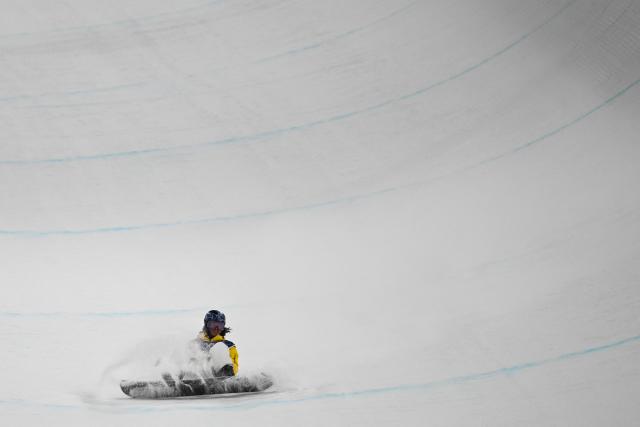 Australia's Valentino Guseli competes in the snowboard men's halfpipe final run 2 during the Milano Cortina 2026 Winter Olympic Games at Livigno Snow Park, in Livigno (Valtellina), on February 13, 2026. (Photo by Jeff PACHOUD / AFP)