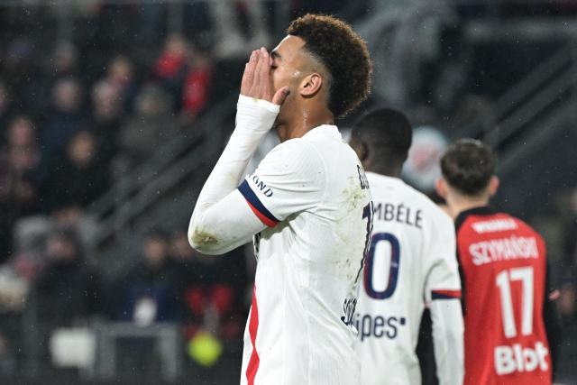 Paris Saint-Germain's French midfielder #14 Desire Doue reacts after missing a shot during the French L1 football match between Stade Rennais FC and Paris Saint-Germain (PSG) at the Roazhon Park stadium in Rennes, western France, on February 13, 2026. (Photo by Damien MEYER / AFP)