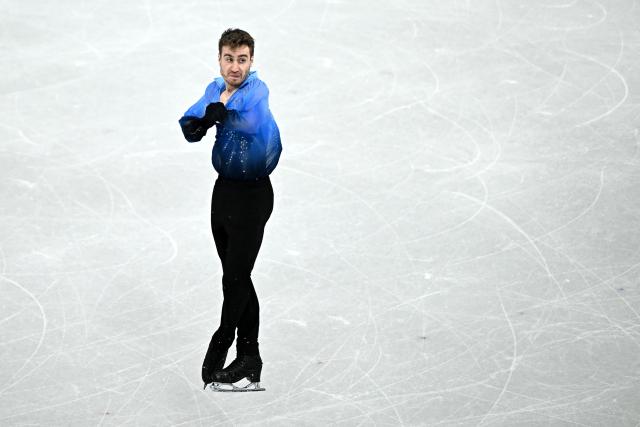 Italy's Matteo Rizzo competes in the figure skating men's singles free skating final during the Milano Cortina 2026 Winter Olympic Games at Milano Ice Skating Arena in Milan on February 13, 2026. (Photo by Gabriel BOUYS / AFP)