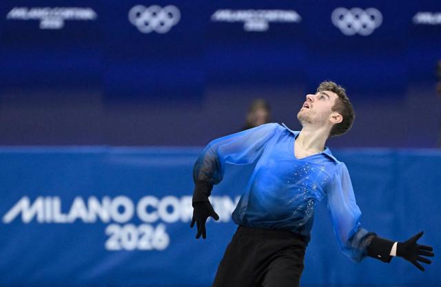 Italy's Matteo Rizzo competes in the figure skating men's singles free skating final during the Milano Cortina 2026 Winter Olympic Games at Milano Ice Skating Arena in Milan on February 13, 2026. (Photo by WANG Zhao / AFP)