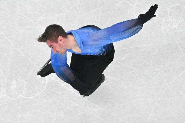 Italy's Matteo Rizzo competes in the figure skating men's singles free skating final during the Milano Cortina 2026 Winter Olympic Games at Milano Ice Skating Arena in Milan on February 13, 2026. (Photo by Antonin THUILLIER / AFP)