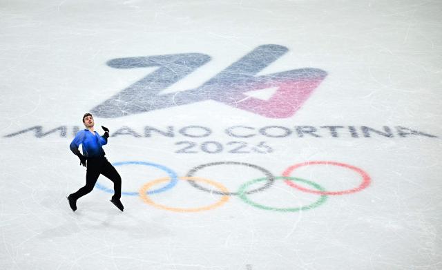 Italy's Matteo Rizzo competes in the figure skating men's singles free skating final during the Milano Cortina 2026 Winter Olympic Games at Milano Ice Skating Arena in Milan on February 13, 2026. (Photo by Gabriel BOUYS / AFP)