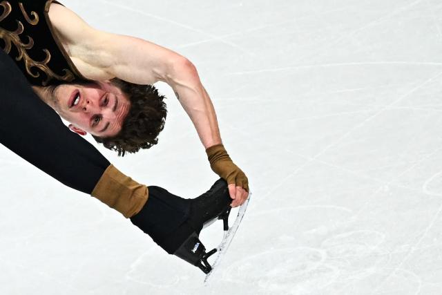 Switzerland's Lukas Britschgi competes in the figure skating men's singles free skating final during the Milano Cortina 2026 Winter Olympic Games at Milano Ice Skating Arena in Milan on February 13, 2026. (Photo by Gabriel BOUYS / AFP)