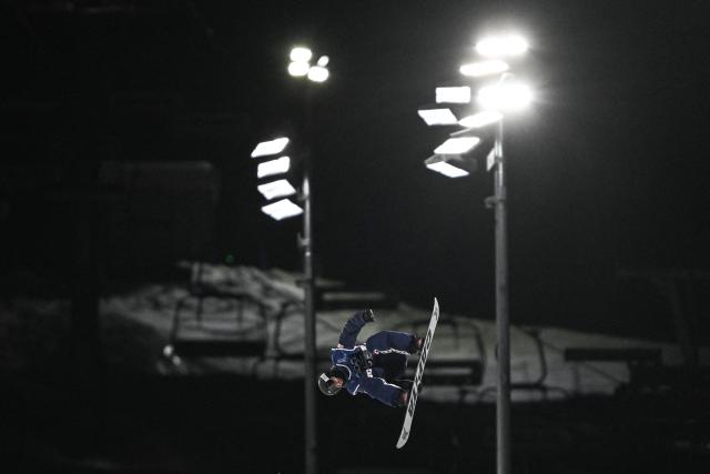 USA's Chase Josey competes in the snowboard men's halfpipe final run 3 during the Milano Cortina 2026 Winter Olympic Games at Livigno Snow Park, in Livigno (Valtellina), on February 13, 2026. (Photo by Jeff PACHOUD / AFP)
