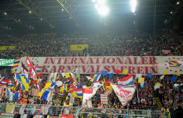 Mainz fans wear carnival outfits prior to the German first division Bundesliga football match between Borussia Dortmund and Mainz 05 in Dortmund, western Germany, on February 13, 2026. (Photo by Sascha Schuermann / AFP) / DFL REGULATIONS PROHIBIT ANY USE OF PHOTOGRAPHS AS IMAGE SEQUENCES AND/OR QUASI-VIDEO