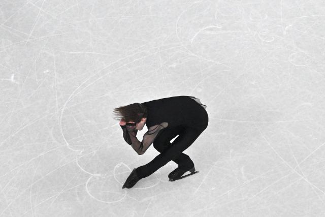 Georgia's Nika Egadze competes in the figure skating men's singles free skating final during the Milano Cortina 2026 Winter Olympic Games at Milano Ice Skating Arena in Milan on February 13, 2026. (Photo by Antonin THUILLIER / AFP)