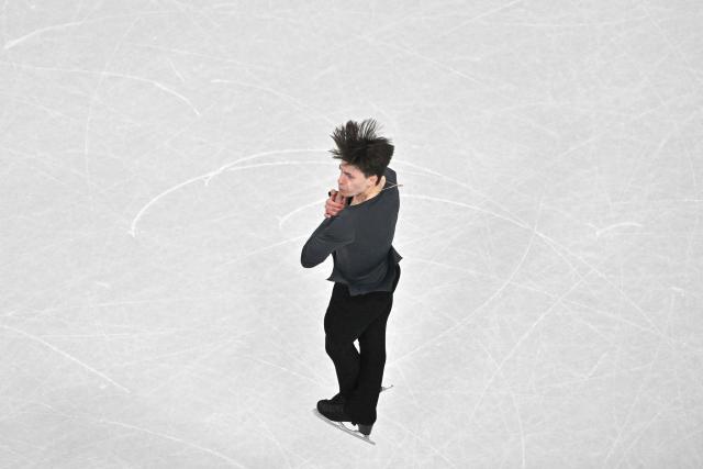 USA's Maxim Naumov competes in the figure skating men's singles free skating final during the Milano Cortina 2026 Winter Olympic Games at Milano Ice Skating Arena in Milan on February 13, 2026. (Photo by Antonin THUILLIER / AFP)