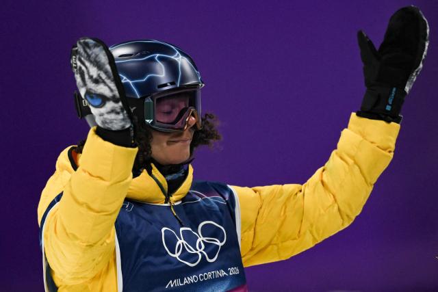 Australia's Valentino Guseli reacts after competing in the snowboard men's halfpipe final run 3 during the Milano Cortina 2026 Winter Olympic Games at Livigno Snow Park, in Livigno (Valtellina), on February 13, 2026. (Photo by Jeff PACHOUD / AFP)